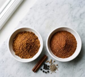 Two bowls side by side, warm baharat seven spice and garlic-forward shawarma seasoning